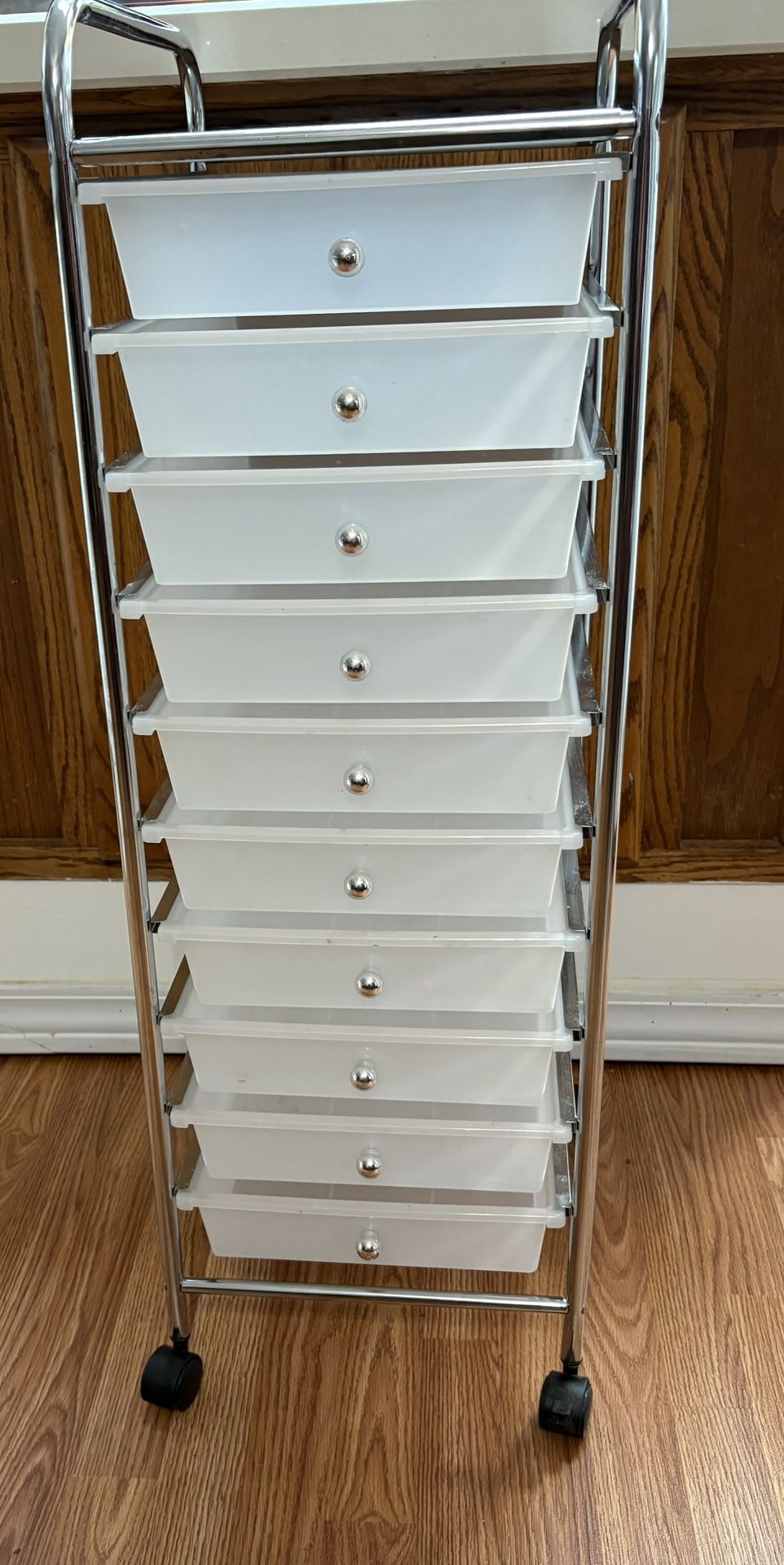 WHITE PLASTIC ROLLER CART