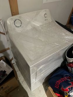 Brand new over the range Microwave and used electric dryer with Agitator