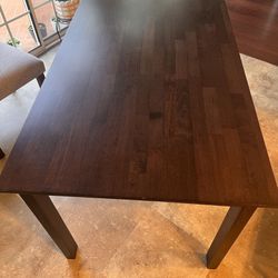 Dining table and chairs and lamp