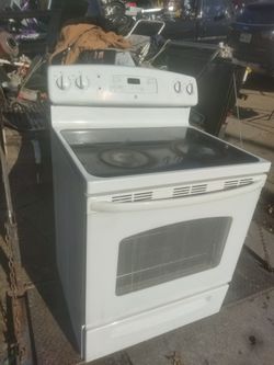 GE Estufa Electrica Tapa De Vidrio Trabajando 