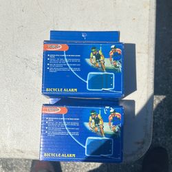 quiver-style bicycle alarm, model YY-010, designed to protect bikes from theft by triggering an alarm if the bike is moved.