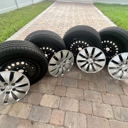 4 Good Tires 215/60R16 With Steel Wheels  Off A 2012 Honda accord