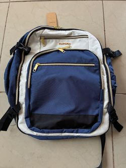Empsign 40L travel backpack in a white and blue colorway featuring gold-tone zippers and multiple organizational compartments.