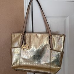 Michael Kors Jet Set Mirror Metallic Gold Tote Bag in Signature MK Pattern.