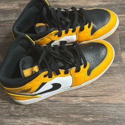Yellow Nike Air Jordan 1s