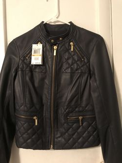 Micheal Kors leather jacket (small)