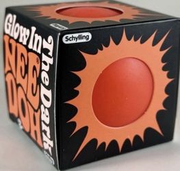 Brand new orange glow in the dark needoh.