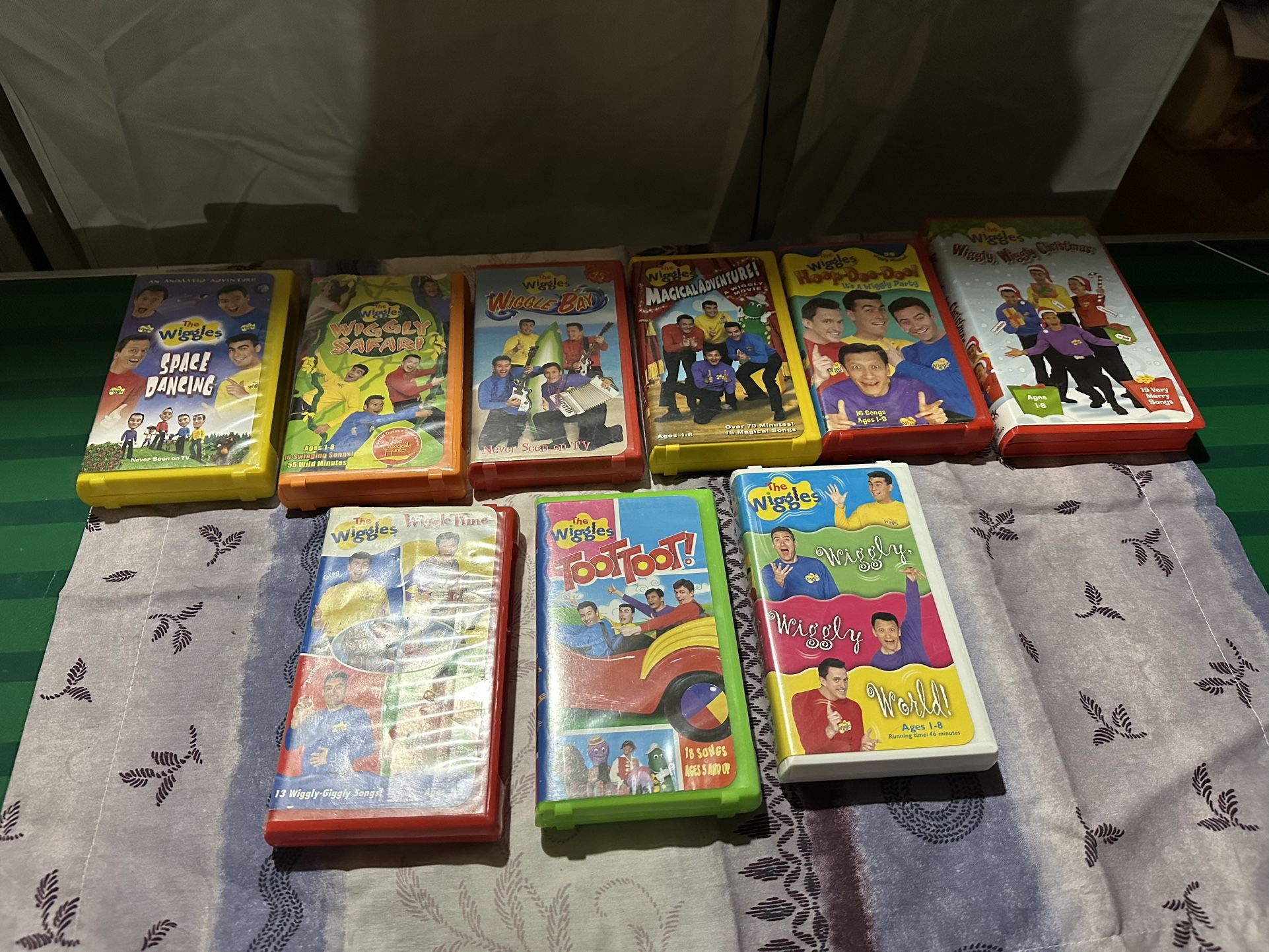 Lot of nine The Wiggles VHS tapes with original cast