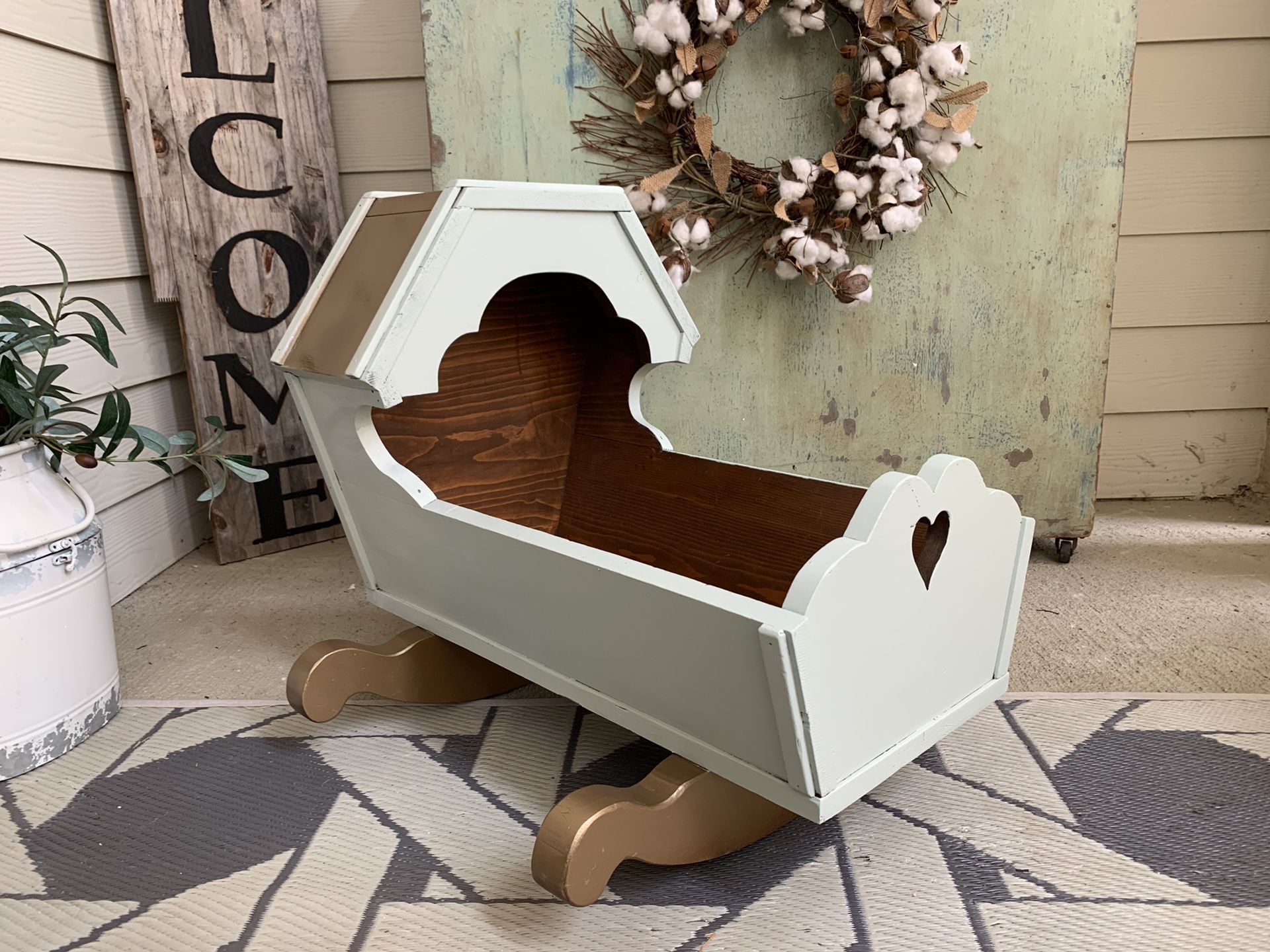 Antique baby doll cradle given a new modern look
