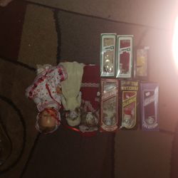 Antique Doll Collection  9 Dolls total ..One Doll has a pull string that Music Plays Go To Sleep Little Baby!