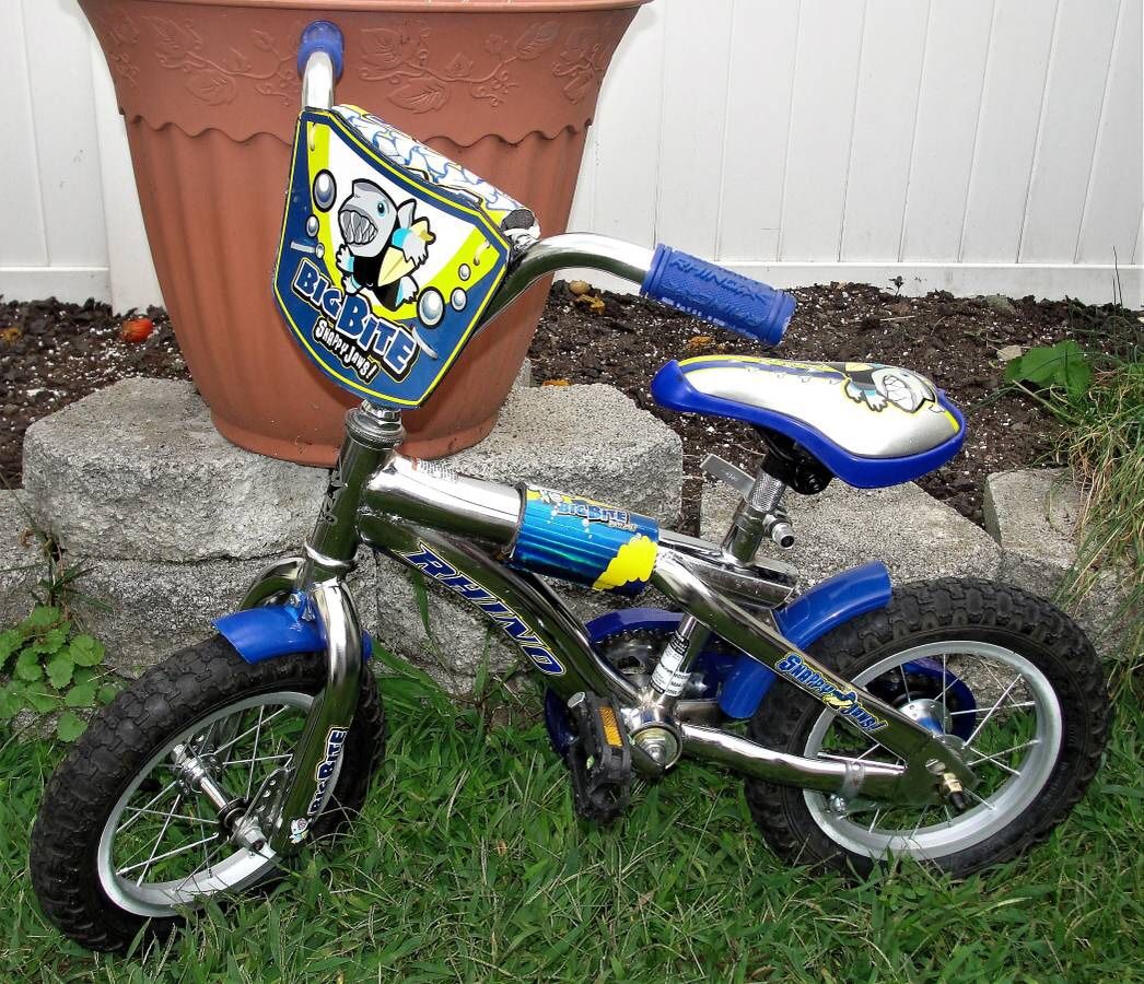 Rhino .. Big Bite Shark .. Snappy Jaws .. 12" .. Blue and Chrome .. BMX .. Kids Bike. This is a 12" bike (wheel size) designed for ages 3-5 year. Goo