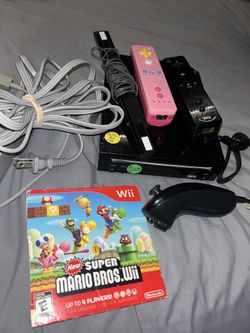 Nintendo Wii w/ Controllers & Super Mario Bros