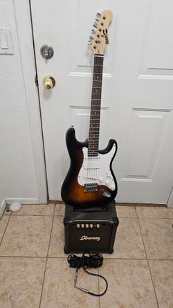 Electric guitar with amplifier