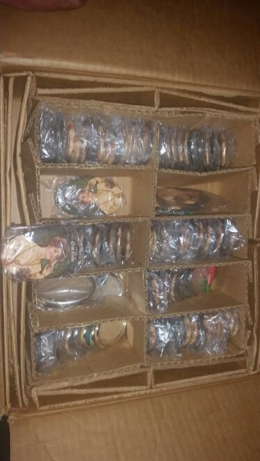 Approximately 350 new old stock coca-cola mirrors brand new in wrapper