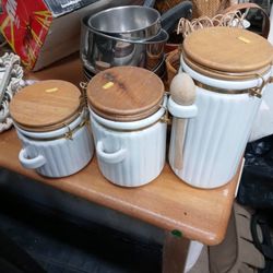 A Set Of Three Canisters