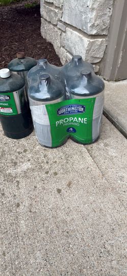 5 NEW CANS OF PROPANE