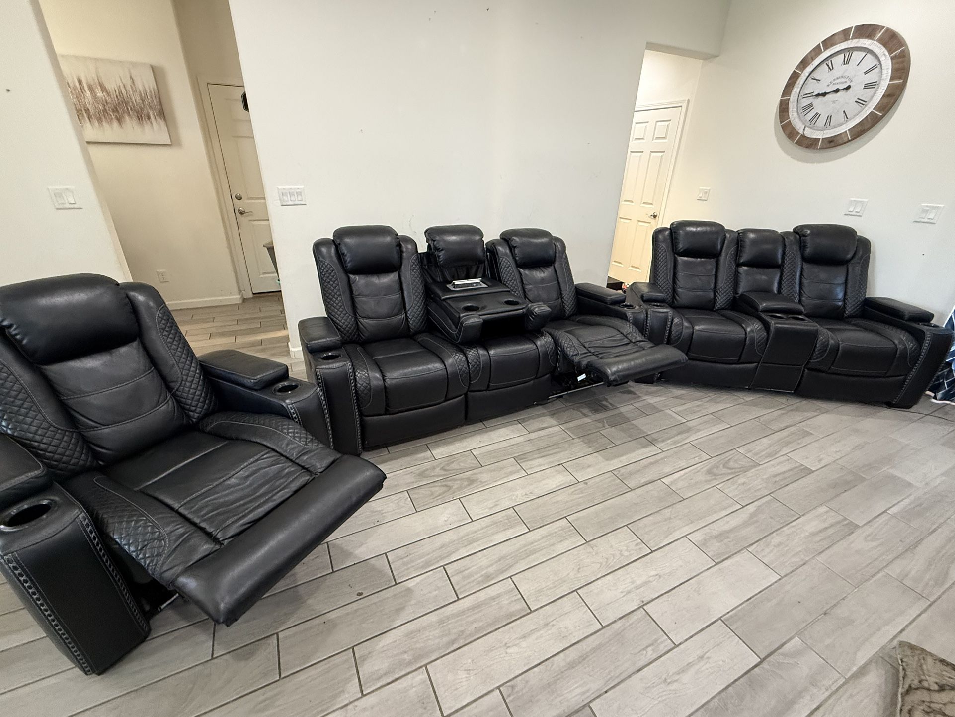 Ashley's 3 piece power reclining set - $1,500 (Santa Fe)