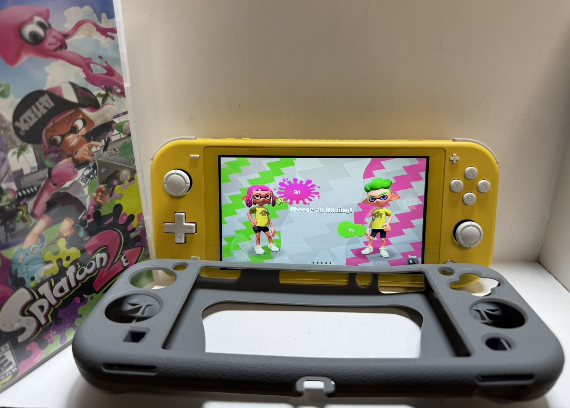 Nintendo Lite Switch Yellow with Splatoon 2 Charger and Protector Sleeve