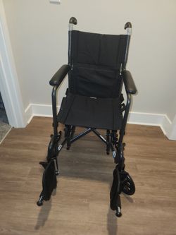 Folding Transport Wheelchair with Footrests