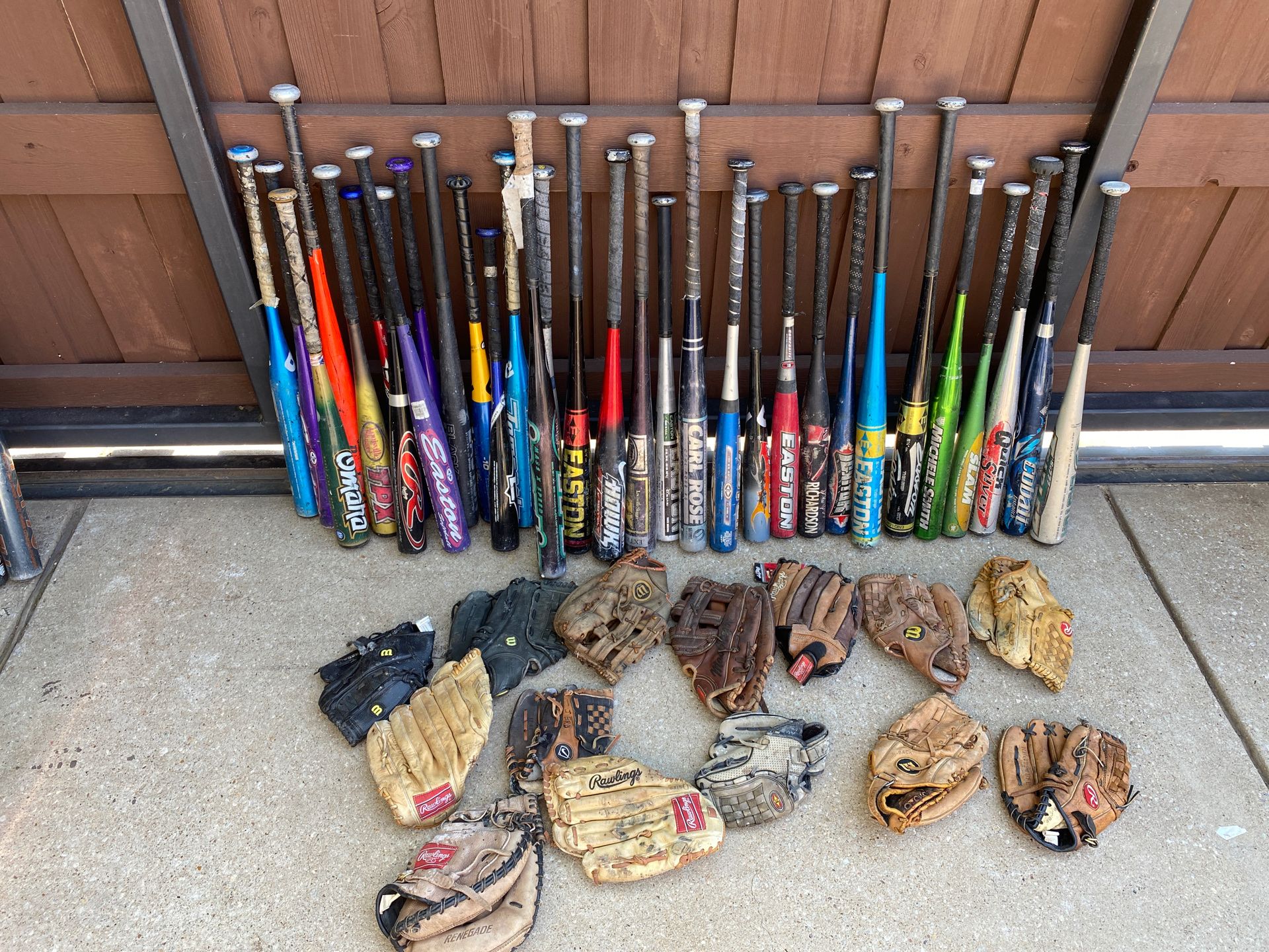 Baseball and softball lot. Bats and gloves. Will sell only together