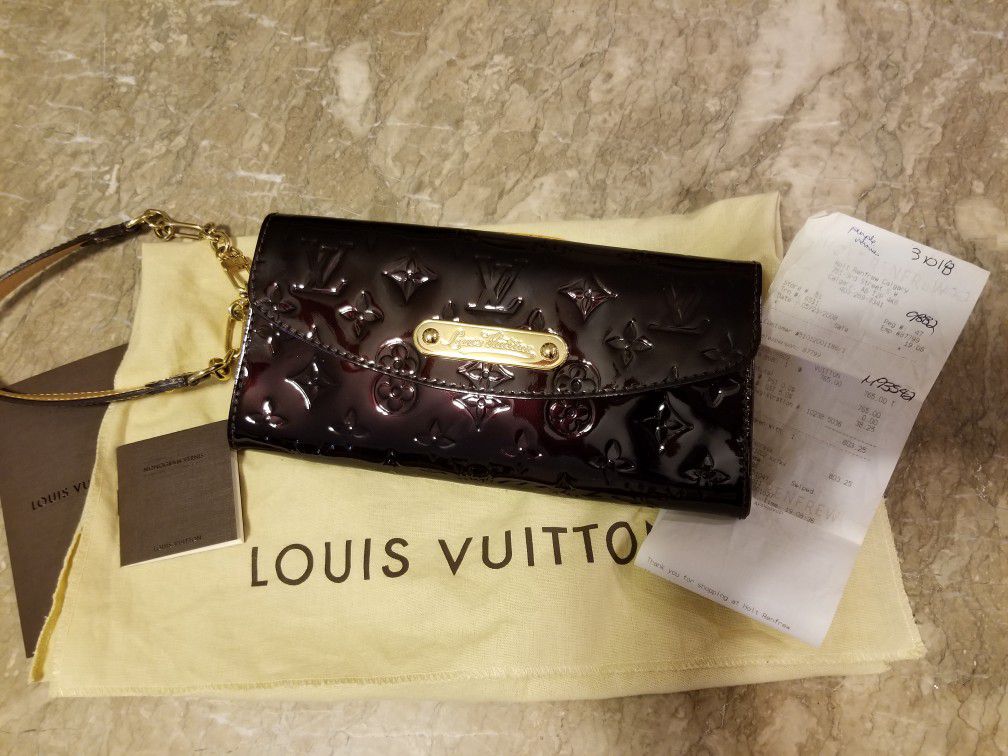Louis Vuitton Sunset Boulevard wallet on a chain with receipt for