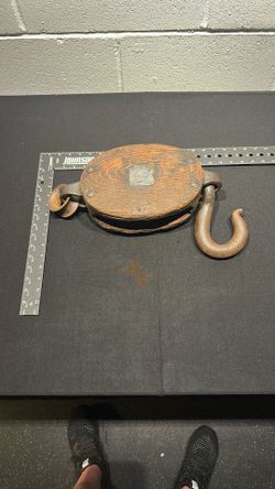 antique wooden block and tackle pulley system