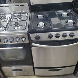 stove 24 inches gas stainless great conditions 4 burner warranty ready to deliver..curbside only