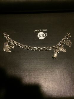 Non vintage sterling silver charm bracelet