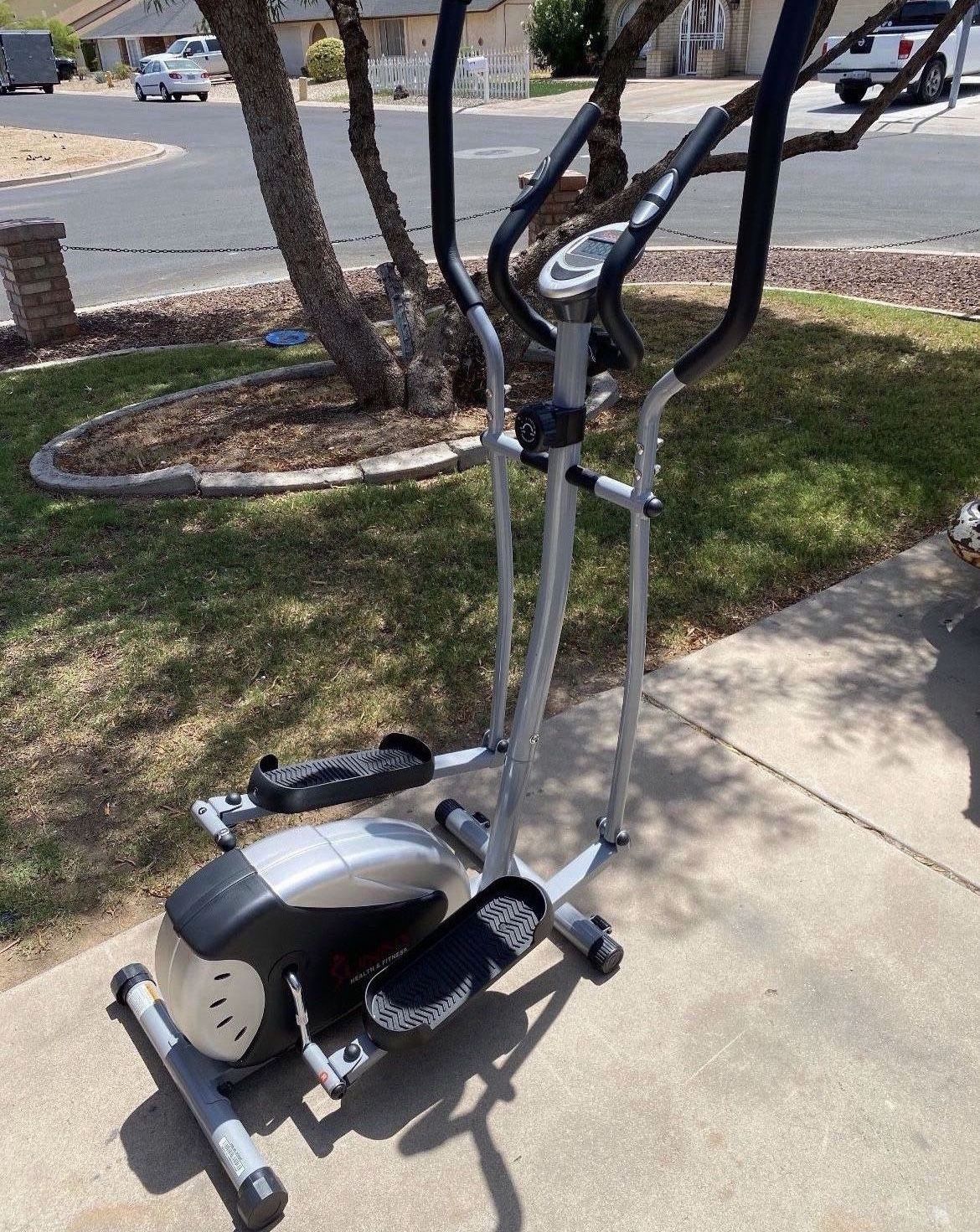 Sunny Health & Fitness SF-E905 Elliptical Machine Cross Trainer with 8 Level Resistance and Digital Monitor