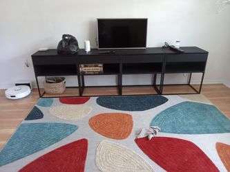 Four pieces used as a large TV stand with drawers and cubbies $40