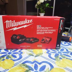 Milwaukee Brand New M18 18-Volt Lithium-Ion Starter Kit with One 5.0 Ah and One 2.0 Ah Battery and Charger