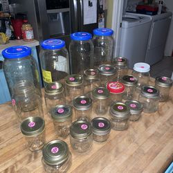 Lot of assorted glass canning food jars