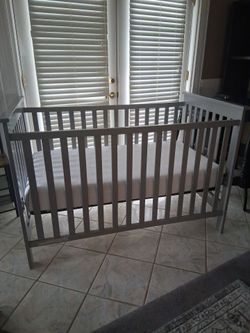 Delta baby crib and mattress
