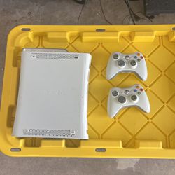xbox 360 with 3 controllers and games