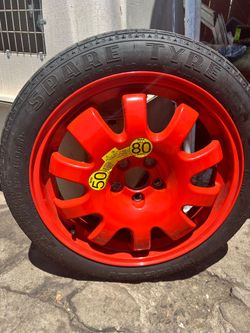 Jaguar compact spare tire and wheel rim