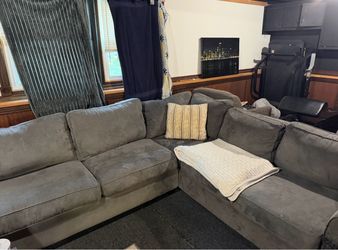 Free sectional. Rough shape from cats. Will need side covers or a couch cover. Only torn on sides