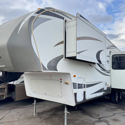 2011 keystone cougar 297RKS 33ft fifth wheel with 2 large slide outs
