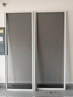 Brand new white double wide patio screen door(s) (together 72” x 96”)