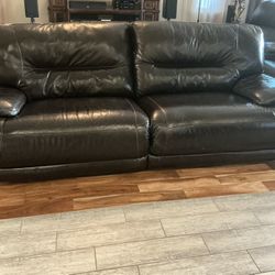 Ashley Furniture Exhilaration 2 Piece Leather Sofa And Loveseat