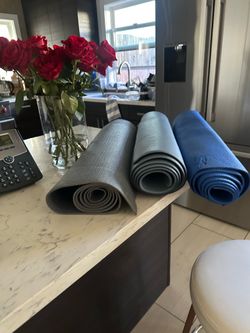 Three yoga mats, each five dollars
