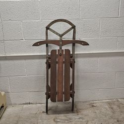 Vintage wood and metal runner sled, likely a "Snow King" or "Yankee Clipper" model. 
