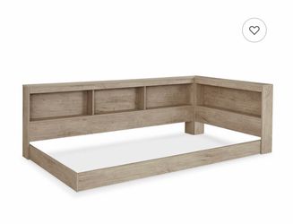 Twin bed frame with storage cubbies