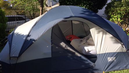 Ridgeway Two Bedroom tent with a partition separating the two sides, Sleeps four