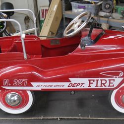 FIRE TRUCK PEDAL CAR N.281 JET FLOW DRIVE BY GEARBOX VINTAGE ORIGINAL METAL WORK.   used, collectible. condition are good for it's age. might need min