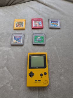 Gameboy Pocket Edition (Yellow) with games $200