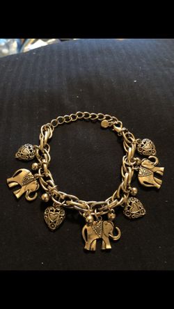 Women’s 14 kt gold plated elephant bracelet 7/1/2 inch no refunds