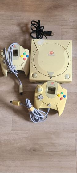 Sega dreamcast with 2 controllers and power cable missing TV cable
