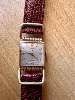 Classic 1940s Lord Elgin driver’s watch with a 14K gold filled case and 21 jewel ruby movement.  Running great. Light wear from age consistent with a 