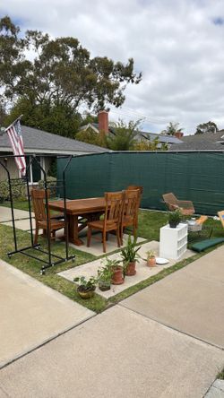 new foam top surfboard Free Stuff!! Dining table four chairs and bench, plants, rolling clothes rack, shoe racks, ukulele banjo, dope outdoor chair, a