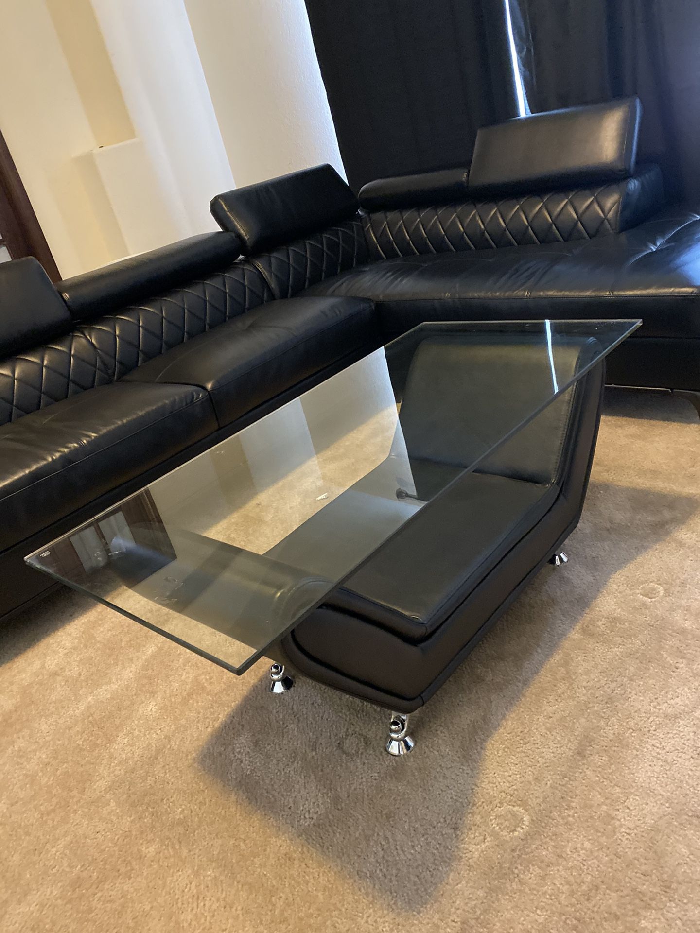 Black leather couch / sectional plus table